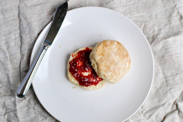 strawberry jam on a biscuit