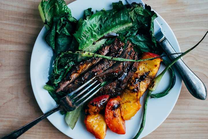 grilled steak salad with garlic scapes and peaches // brooklyn supper