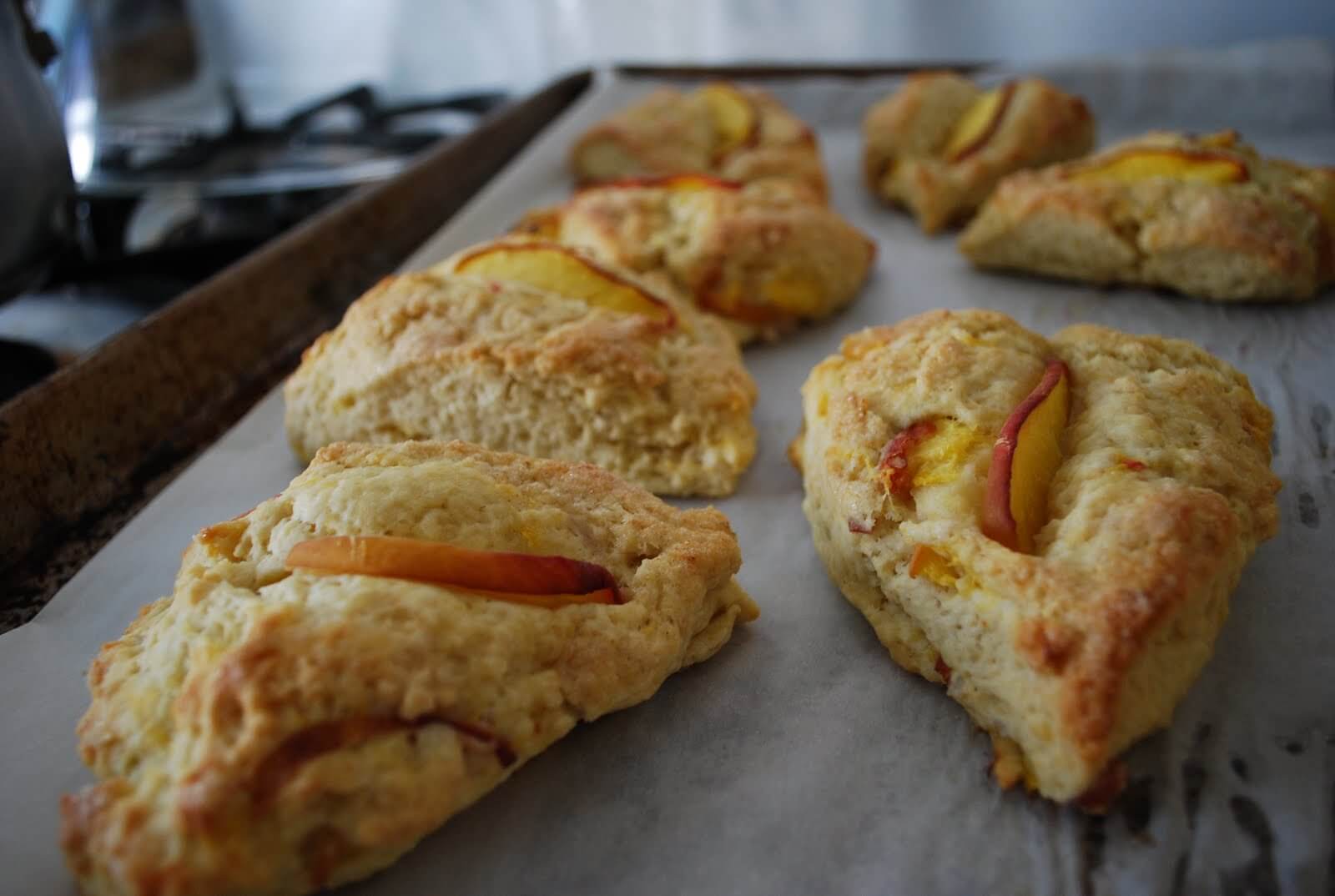 Cream from a local dairy and farm fresh peaches make these simple peach scones stand out. Perfect for a summer brunch or as a complement to your morning cup of tea. 