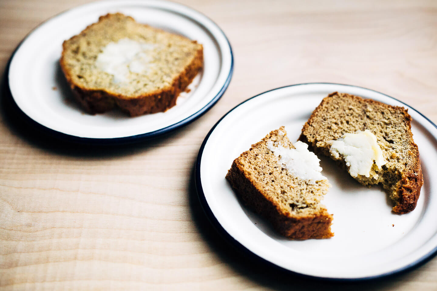 Basic banana bread with a smear of salted butter.