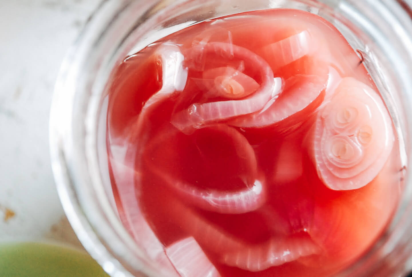 A recipe for punchy and vibrant quick-pickled red onions that lend pop and crunch to everything from sandwiches to salads. 