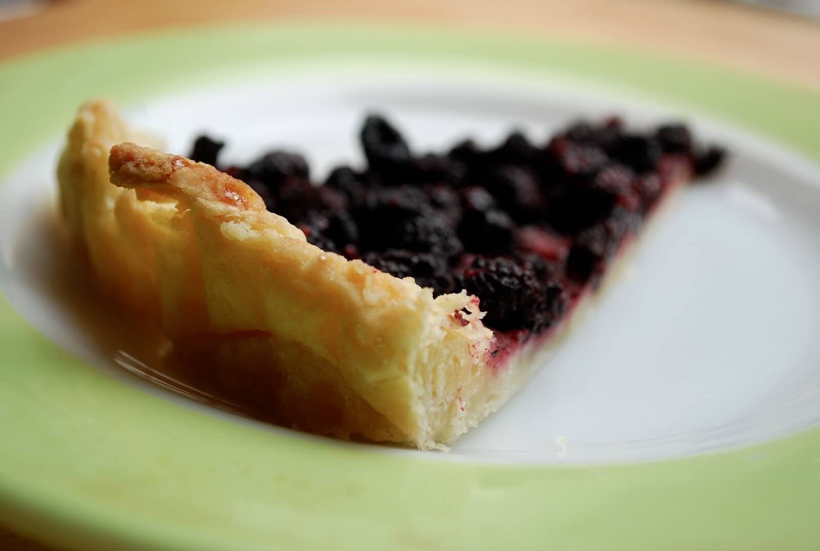 A slice of black raspberry tart. 