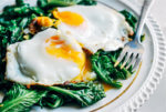 Garlicky sautéed greens and over easy eggs
