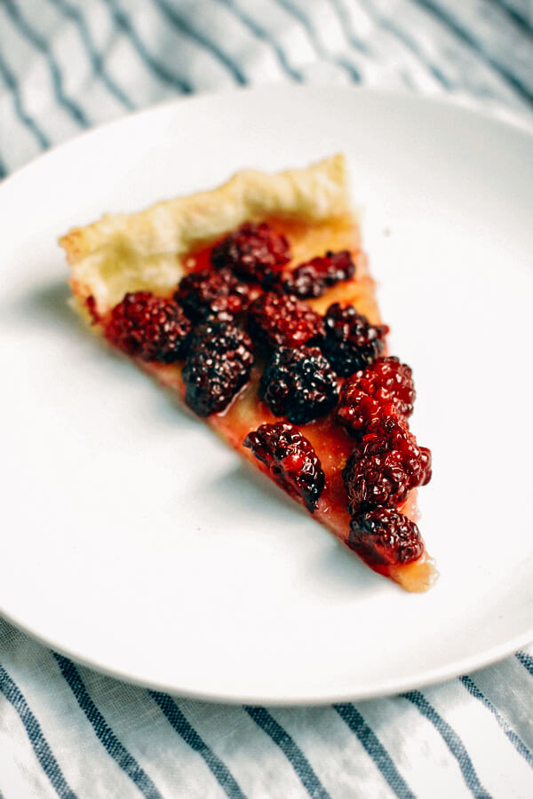 An incredibly easy blackberry tart recipe brimming with all the goodness of fresh fruit simply prepared.