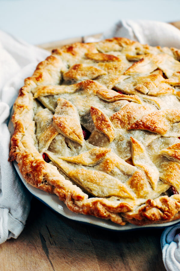 A sweet and tangy cranberry apple pie recipe with a beautiful decorative leaf crust.