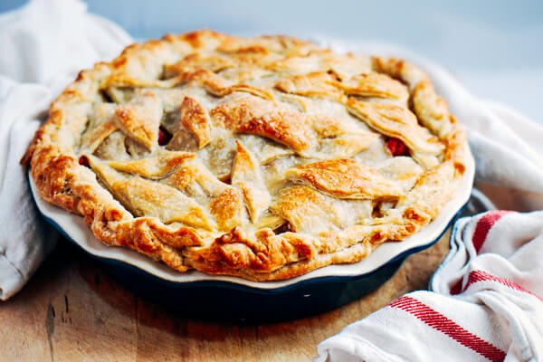 A sweet and tangy cranberry apple pie recipe with a beautiful decorative leaf crust.