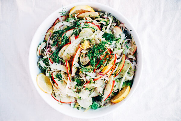 A deliciously refreshing shaved fennel and Brussels sprout salad tossed with sweet apples.