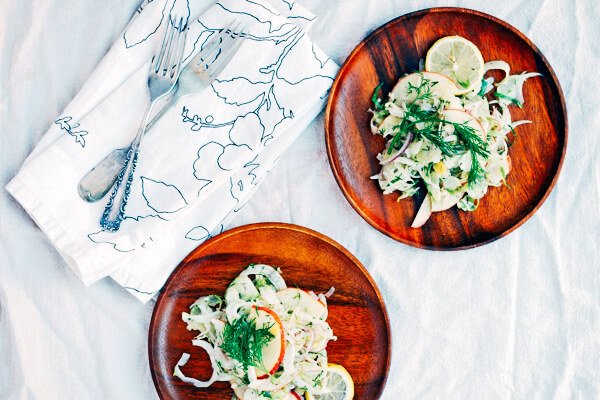 A deliciously refreshing shaved fennel and Brussels sprout salad tossed with sweet apples.