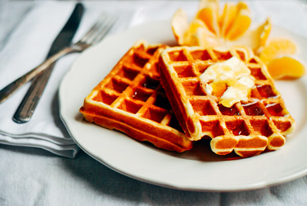Decadent eggnog waffles make for an excellent holiday breakfast treat.