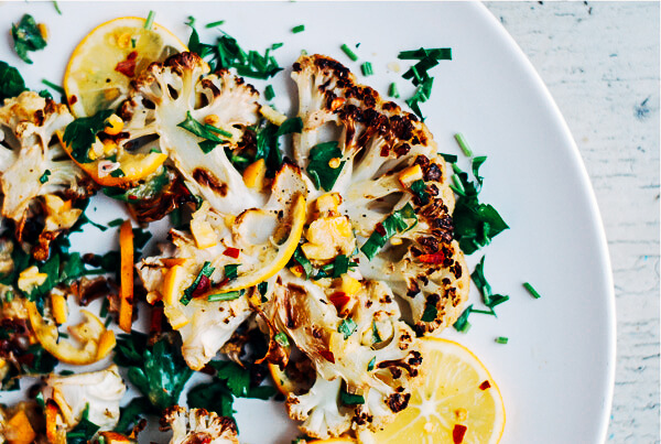 Hearty roasted cauliflower steaks served with a piquant Meyer lemon relish made with shallots and fresh herbs. 