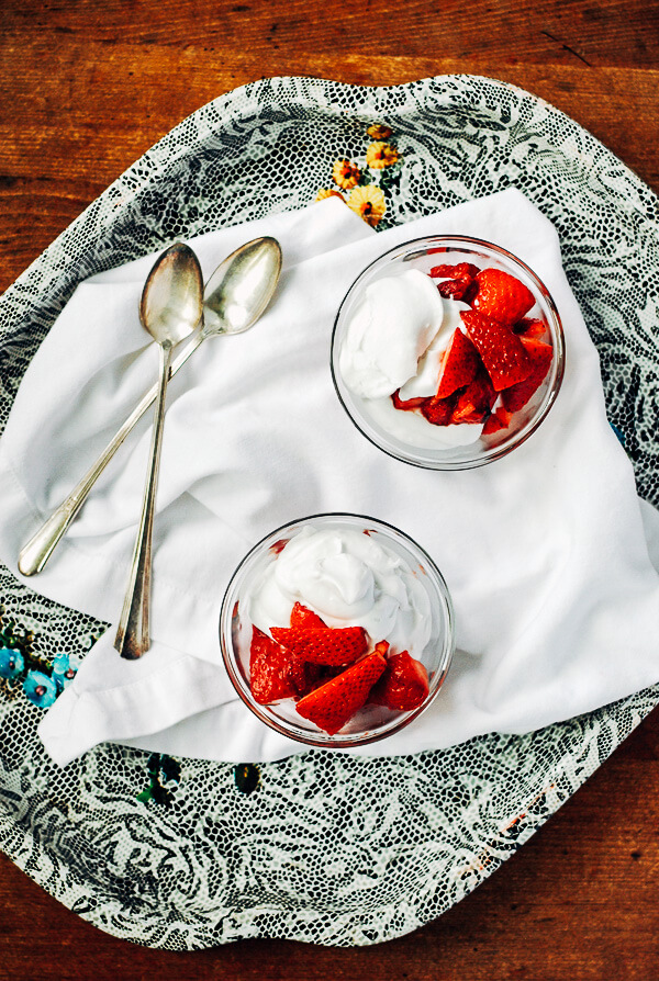 Fresh and roasted strawberries pair beautifully with this easy-to-make whipped coconut cream in this Whole30-compliant dessert.