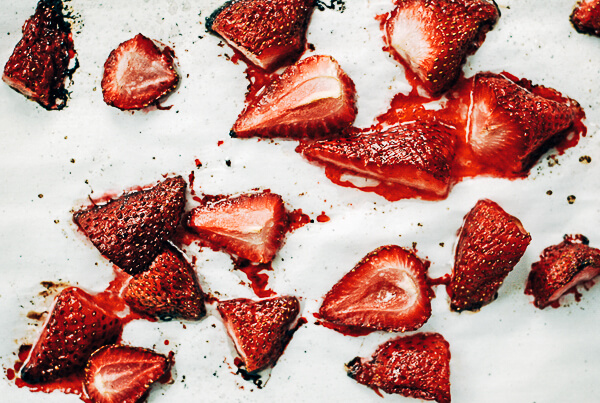 Fresh and roasted strawberries pair beautifully with this easy-to-make whipped coconut cream in this Whole30-compliant dessert.