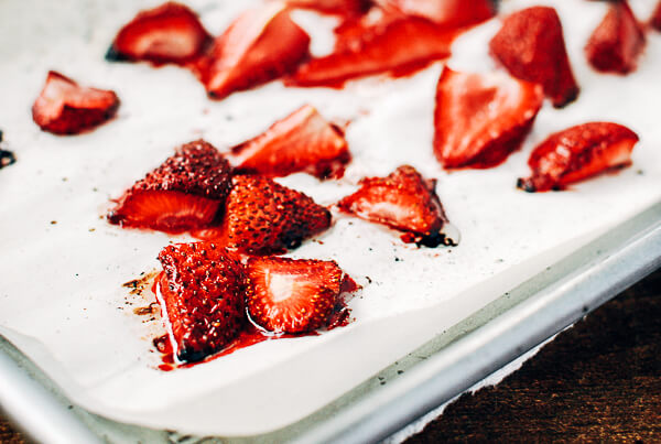 Fresh and roasted strawberries pair beautifully with this easy-to-make whipped coconut cream in this Whole30-compliant dessert.