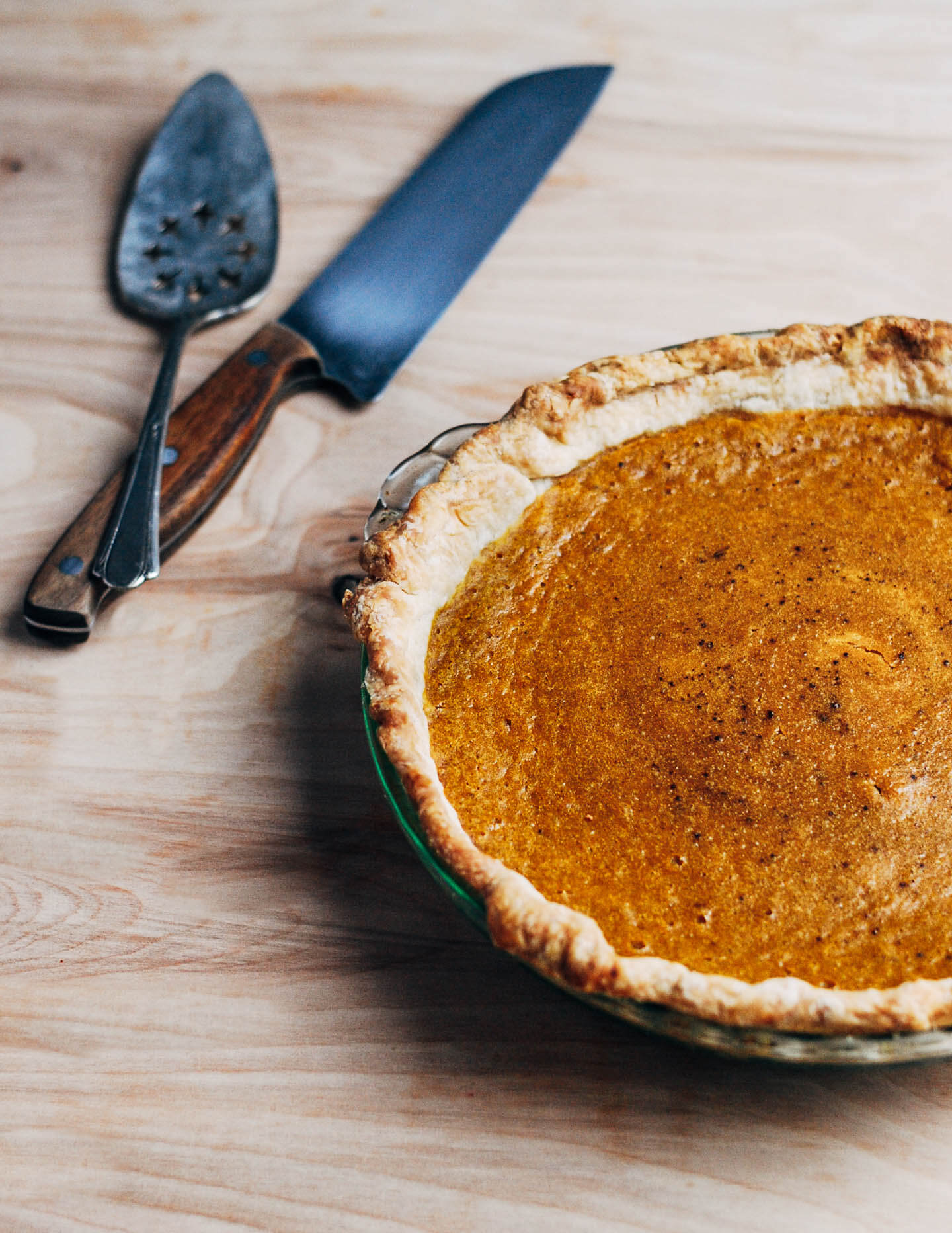 A creative twist on a classic pumpkin pie recipe, this kabocha squash pie is flecked with chipotle chili powder, black pepper, and fresh ginger.