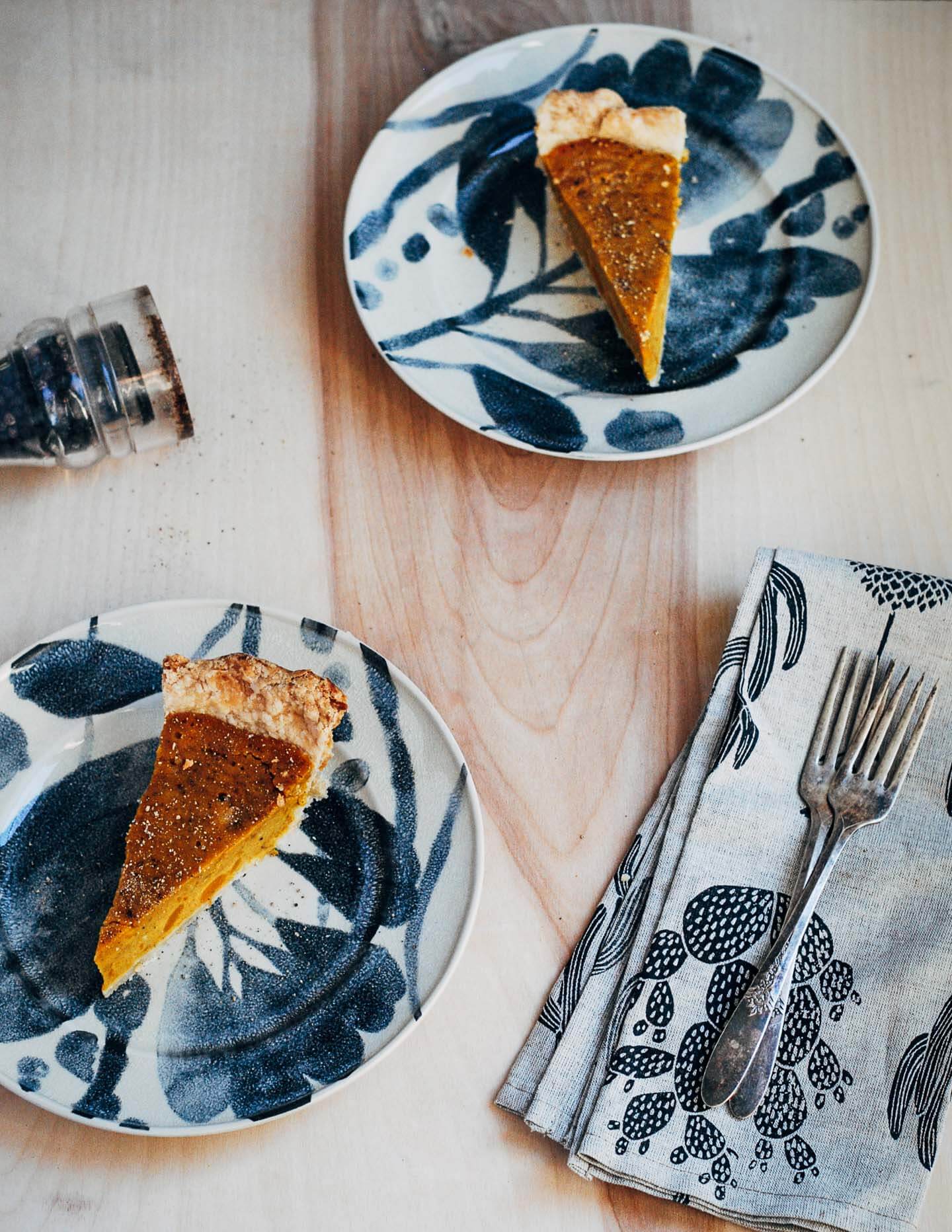 A creative twist on a classic pumpkin pie recipe, this kabocha squash pie is flecked with chipotle chili powder, black pepper, and fresh ginger.