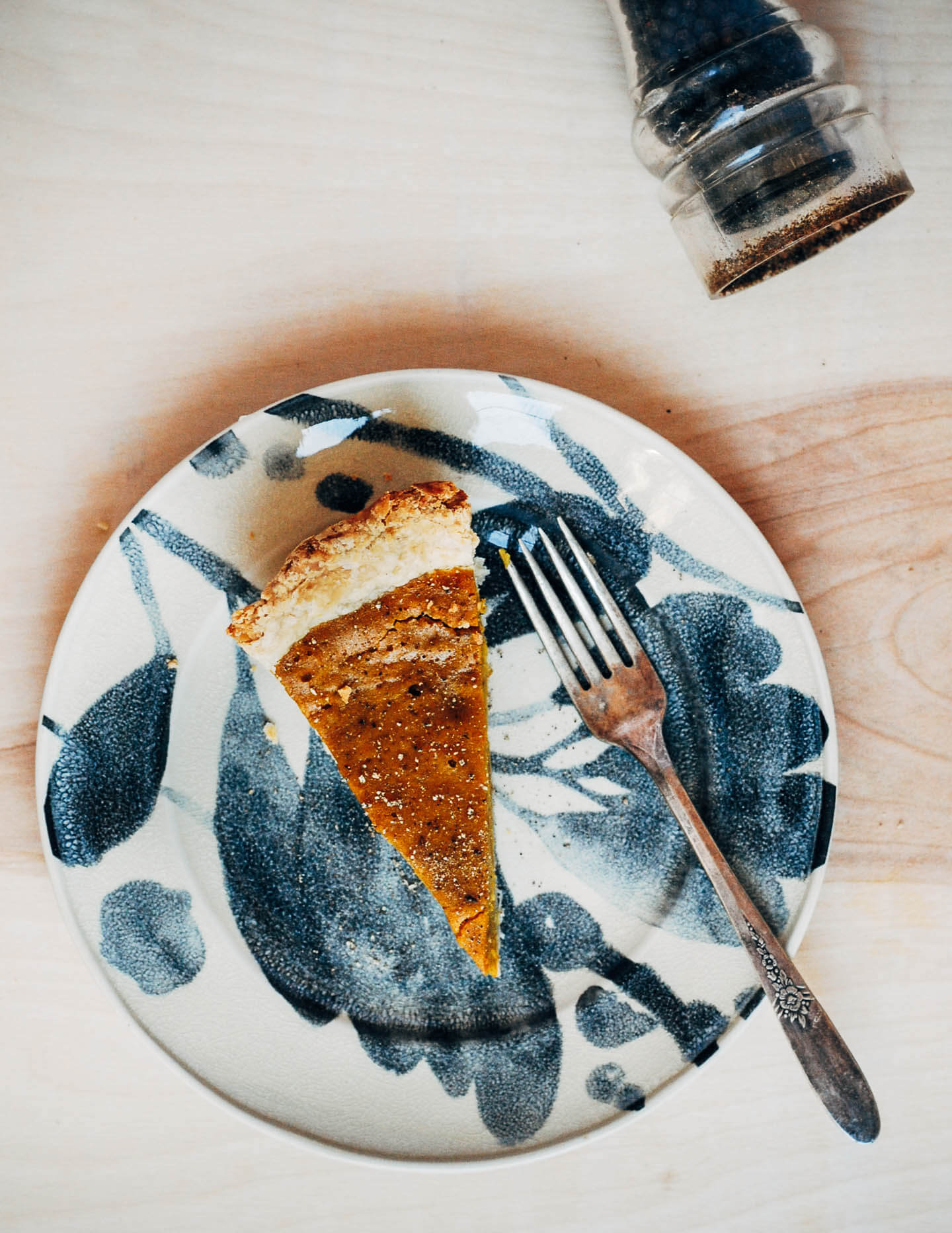 A creative twist on a classic pumpkin pie recipe, this kabocha squash pie is flecked with chipotle chili powder, black pepper, and fresh ginger.