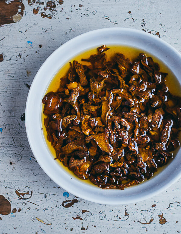A bowl with dried mushrooms soaking in water. 