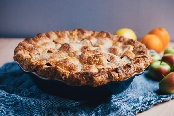 A baking apple pie, seen up close. 