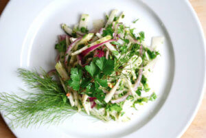 A plate with an herby kohlrabi and fennel salad