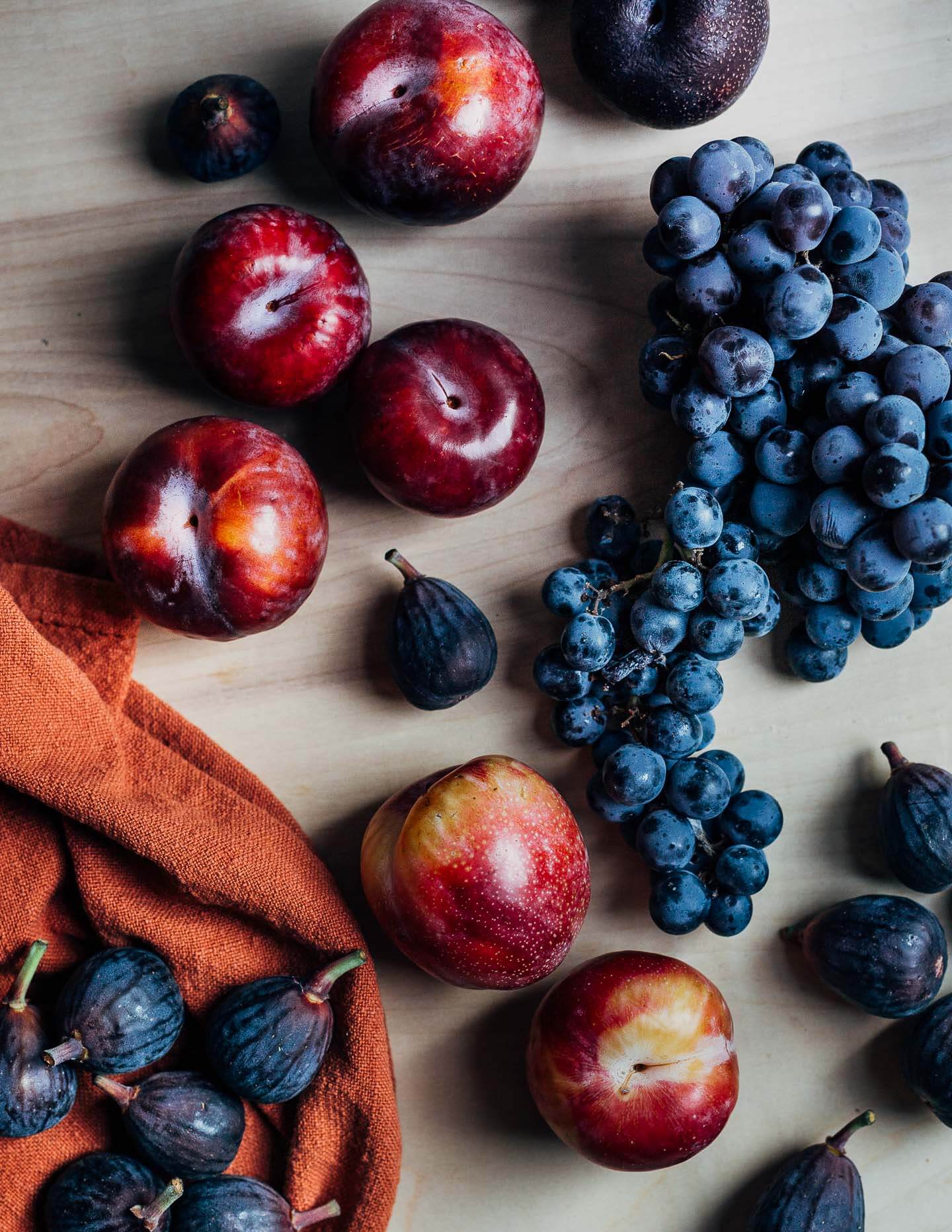 Fall fruit laid out on a tabletop. 