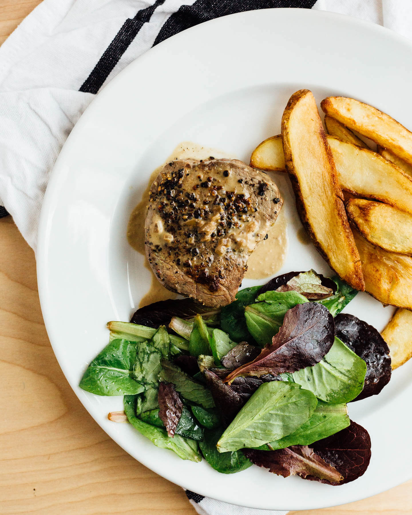 BUTTER BASTED STEAK AU POIVRE AND FRITES 