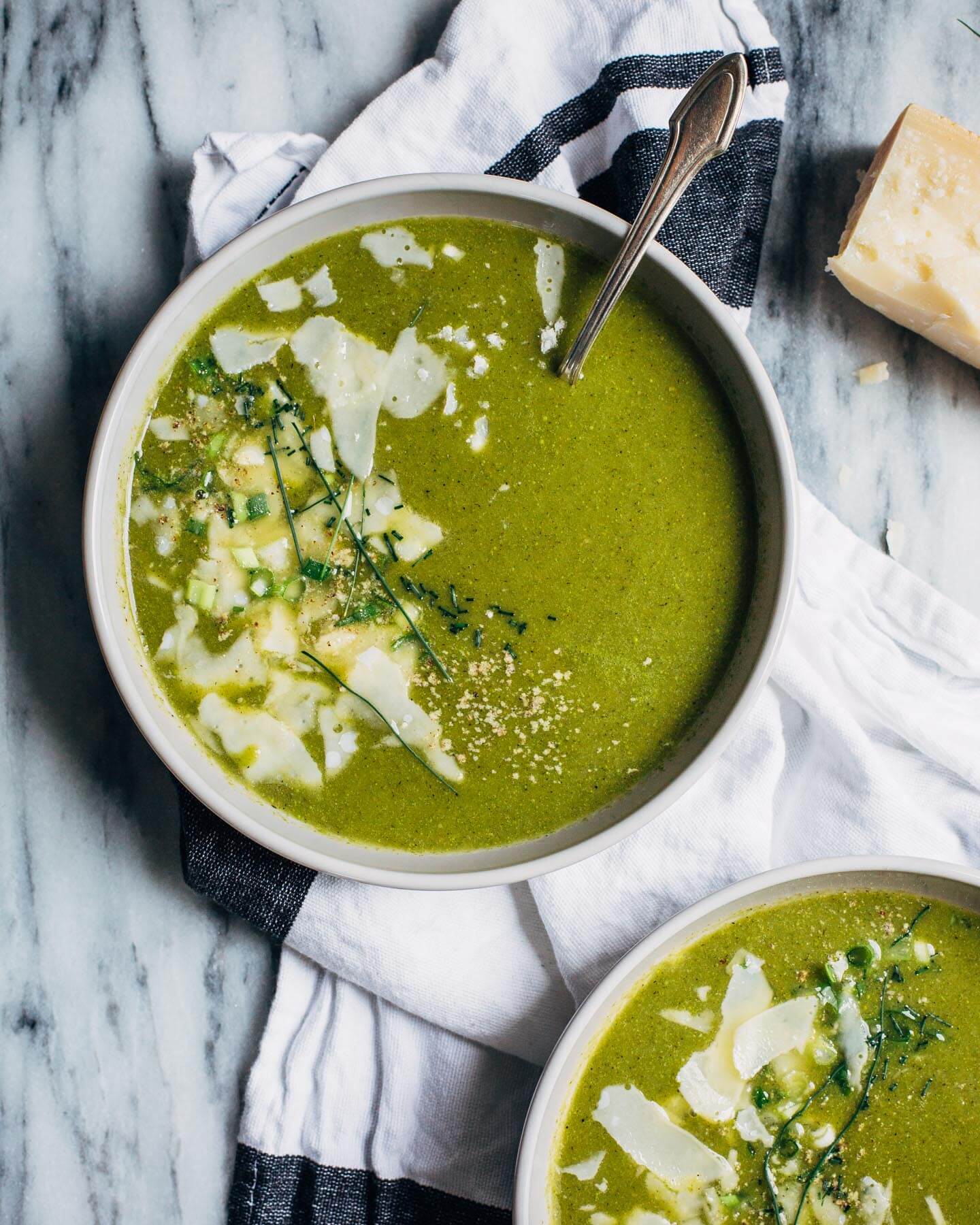 Heralding the arrival of spring produce with a vibrant green spring onion soup. This simple soup comes together quickly and captures the best flavors of early spring, from the sweet pungency of young onions to the punchy pop of tender spring greens.