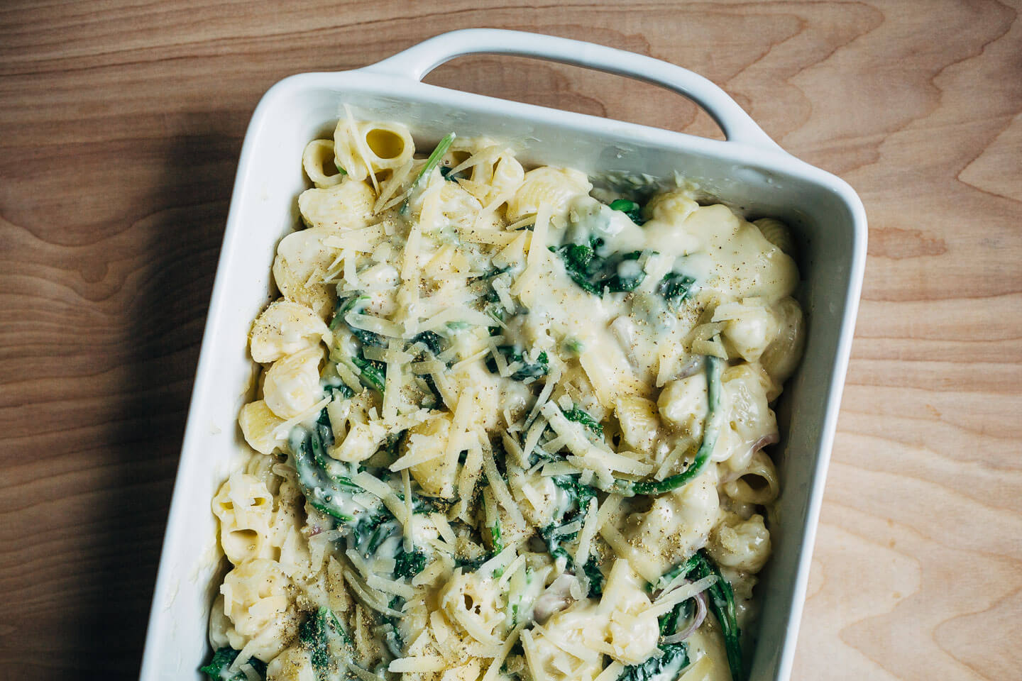 A recipe for mac and cheese with greens that makes delicious use of flavorful, but often forgotten, radish and turnip greens.