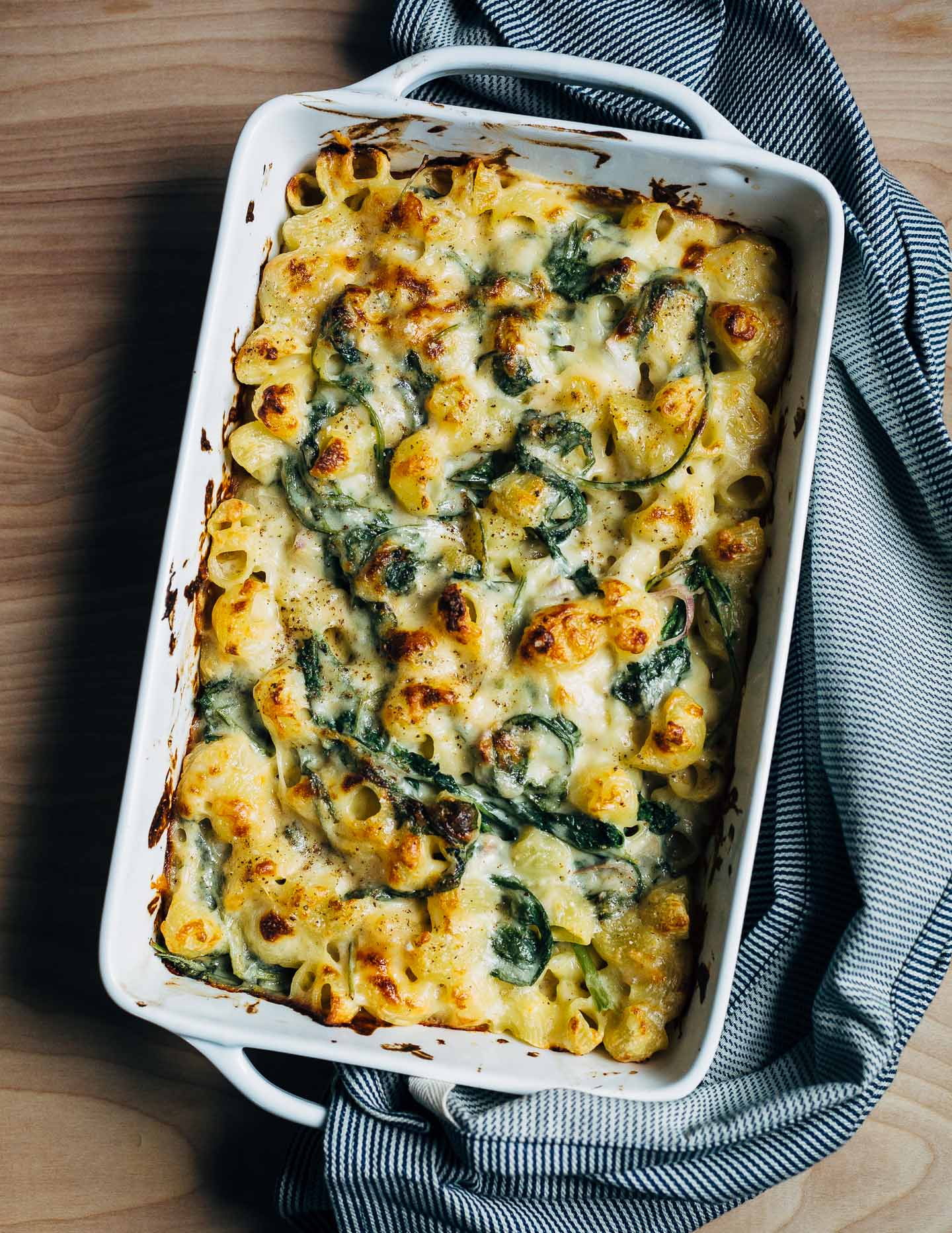 A recipe for mac and cheese with greens that makes delicious use of flavorful, but often forgotten, radish and turnip greens.