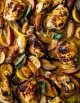 A simple sheet pan chicken and plums recipe featuring crispy saffron- and garlic-infused chicken topped with a sweet and savory plum pan sauce. 