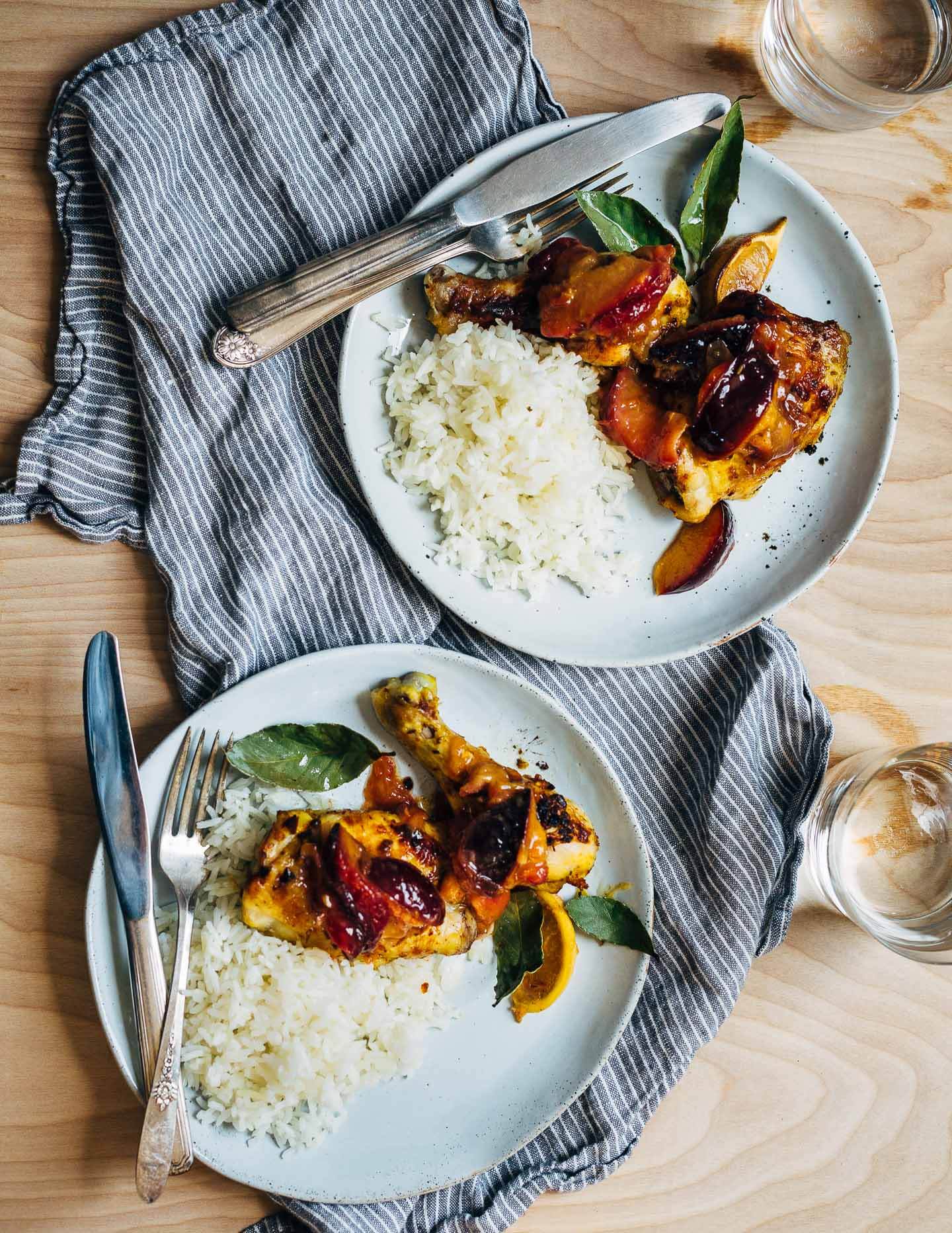 A simple sheet pan chicken and plums recipe featuring crispy saffron- and garlic-infused chicken topped with a sweet and savory plum pan sauce. 