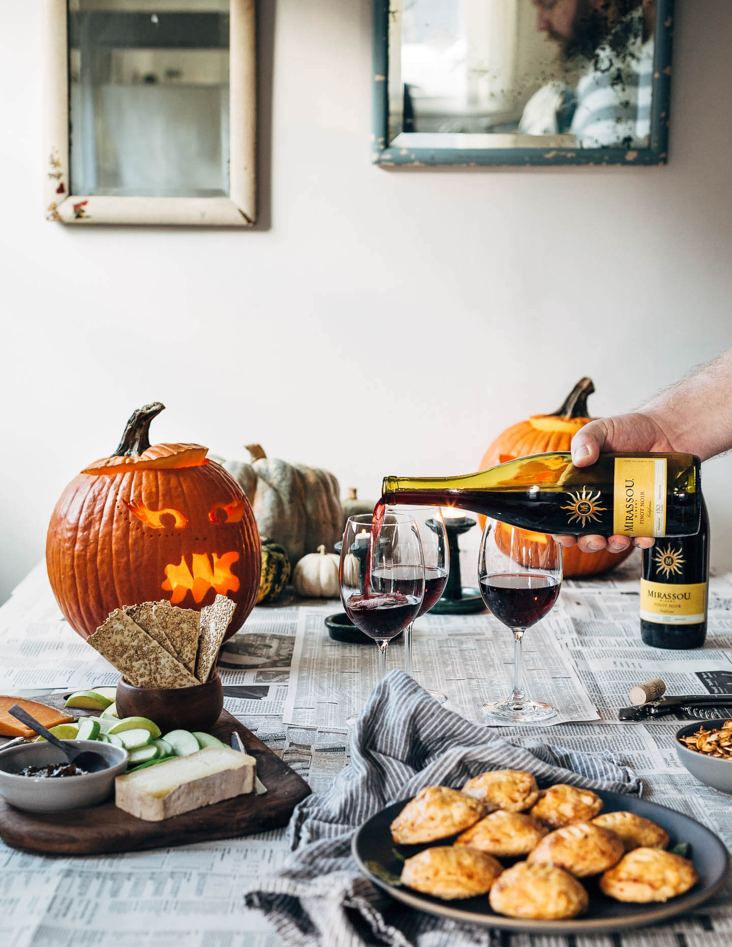 Making a batch of savory bacon, apple and cheddar hand pies and carving pumpkins with friends.