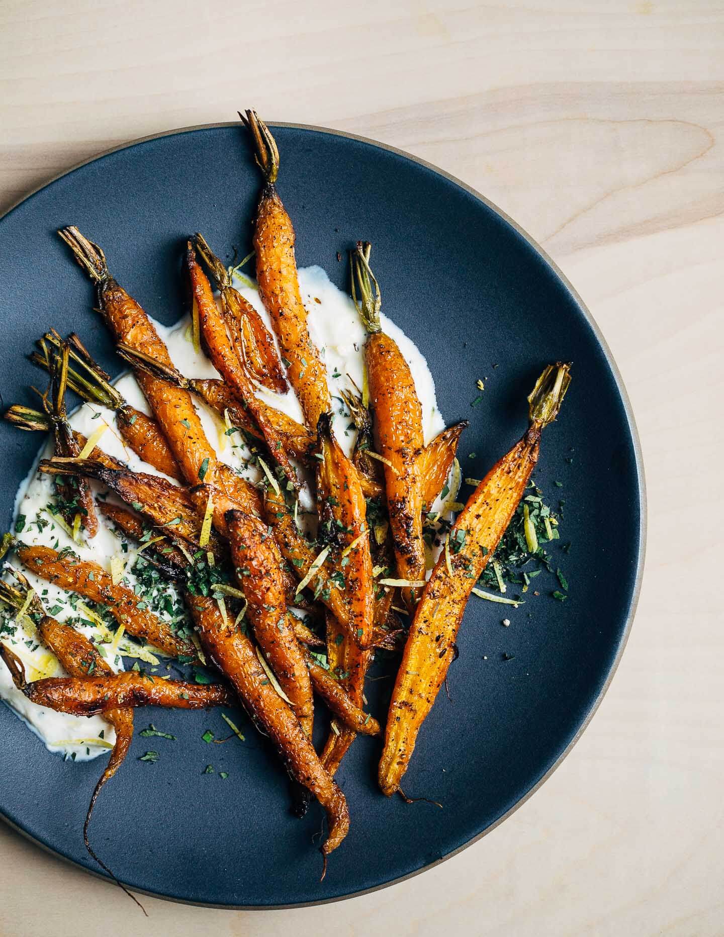 An autumnal recipe for roasted carrot salad with cracked pepper and cumin crème fraîche.