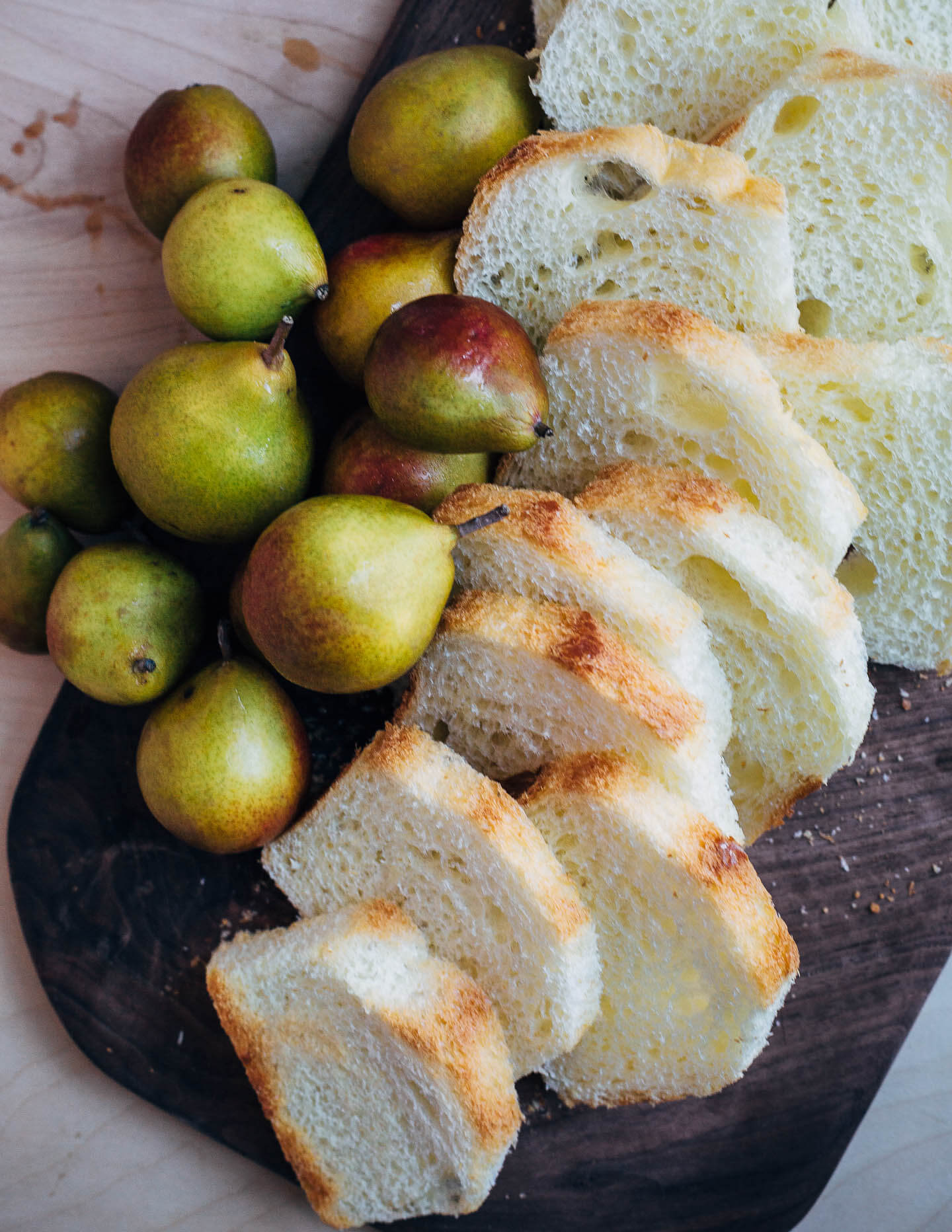 Seckel pears sautéed in brown butter syrup and slices of brioche dipped in cinnamon sugar elevate this simple seckel pear bread pudding recipe. 