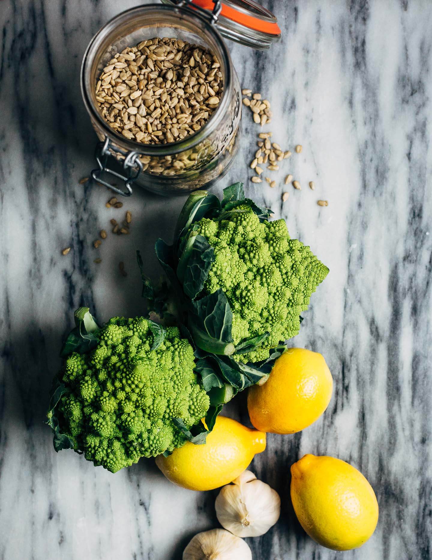 Keep winter eating interesting with this Whole30-compliant recipe for roasted Romanesco broccoli paired with a creamy vegan sunflower seed dressing made with soaked sunflower seeds and fresh Meyer lemons.