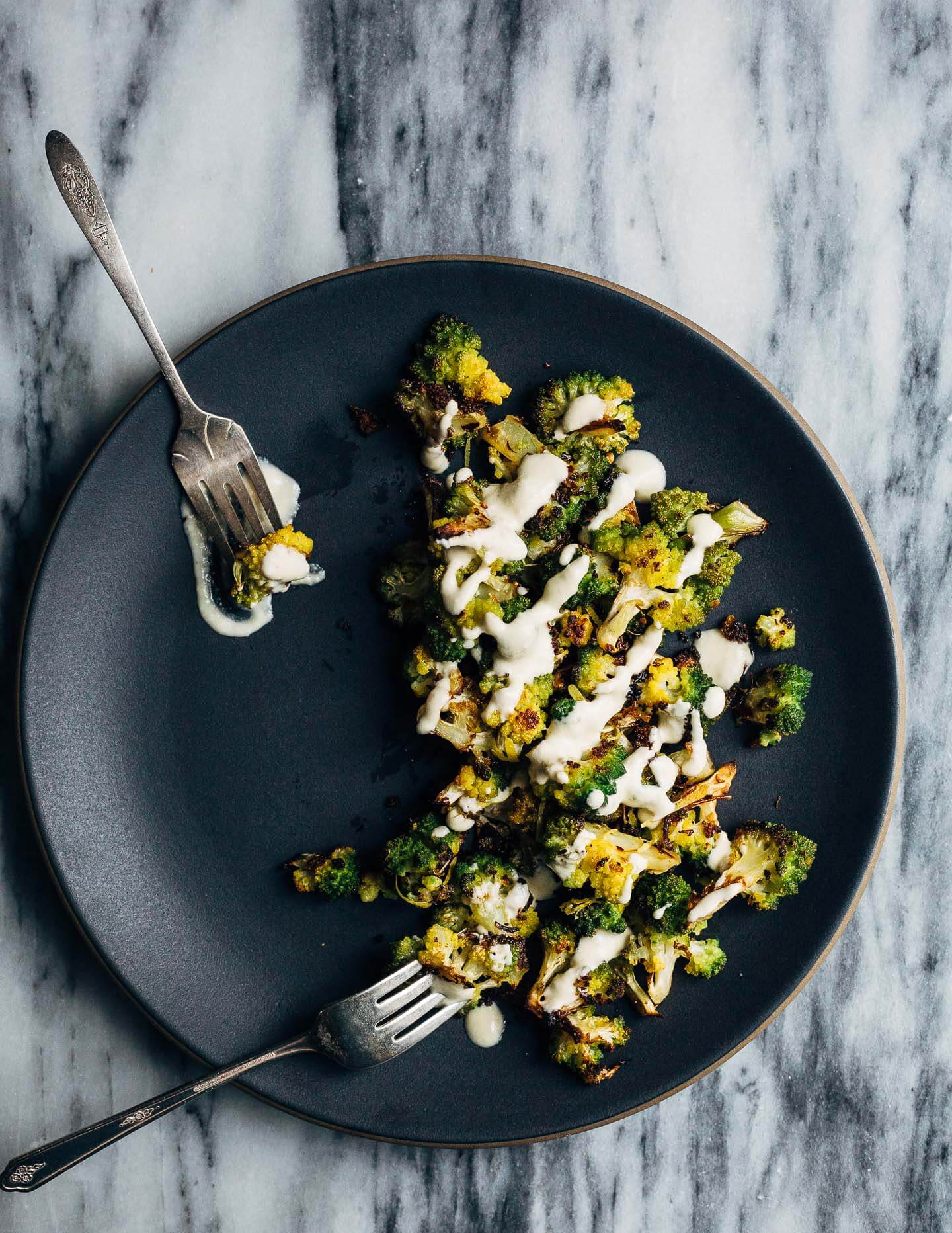 Keep winter eating interesting with this Whole30-compliant recipe for roasted Romanesco broccoli paired with a creamy vegan sunflower seed dressing made with soaked sunflower seeds and fresh Meyer lemons.