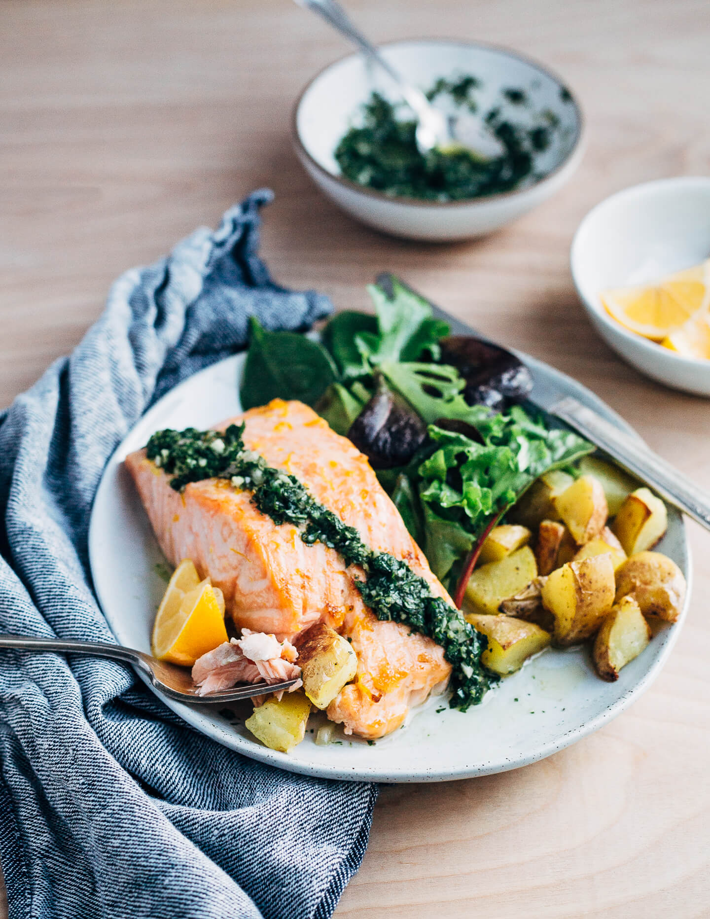Broiled salmon fillets with a vibrant Meyer lemon and mint chimichurri makes for a simple, yet elevated mid-winter meal that's perfect for a Valentine's dinner at home. 