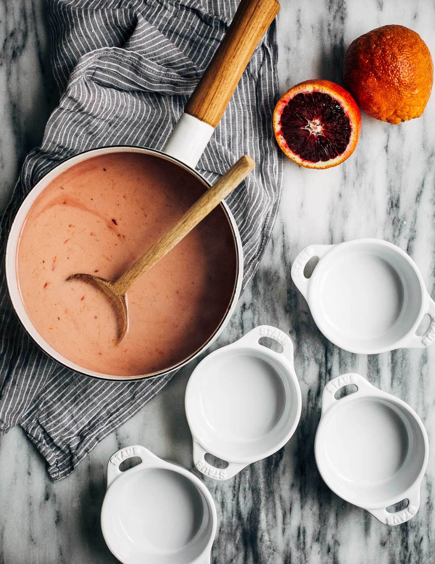 This creamy vegan blood orange panna cotta has a coconut milk base suffused with vanilla bean and clove, and a swirl with ruby-hued blood orange juice on top. Share it with someone you love. 