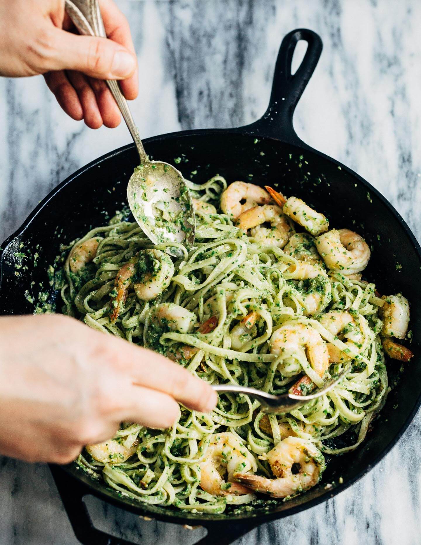 Celebrating the season's first shoots with a vibrant spring onion and chive pesto pasta tossed with sautéed shrimp that's perfect for dinner parties or a quick weeknight meal.