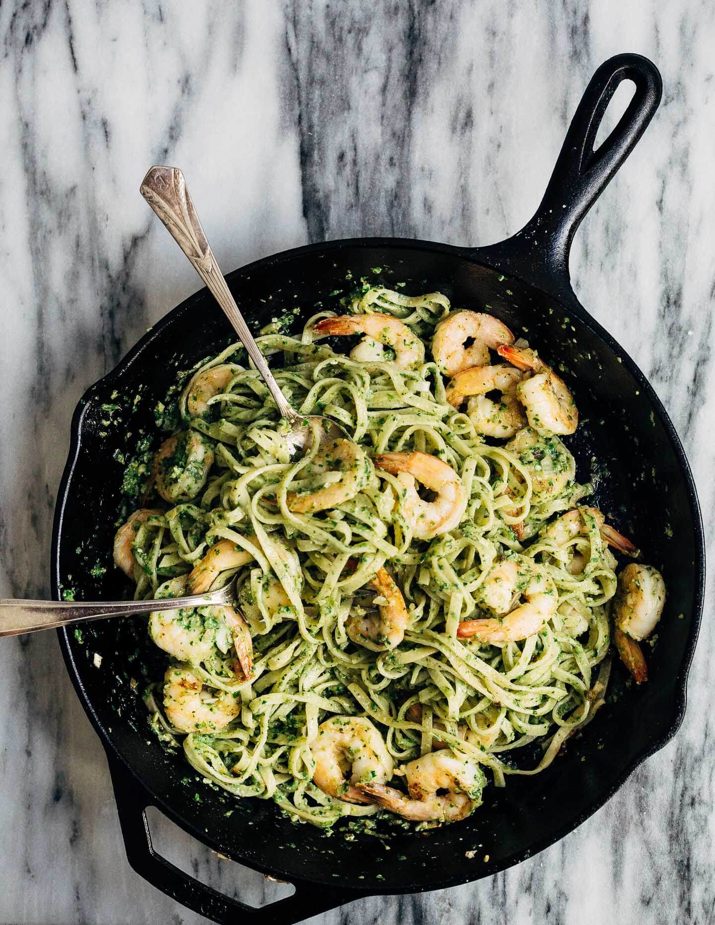 Celebrating the season's first shoots with a vibrant spring onion and chive pesto pasta tossed with sautéed shrimp that's perfect for dinner parties or a quick weeknight meal.