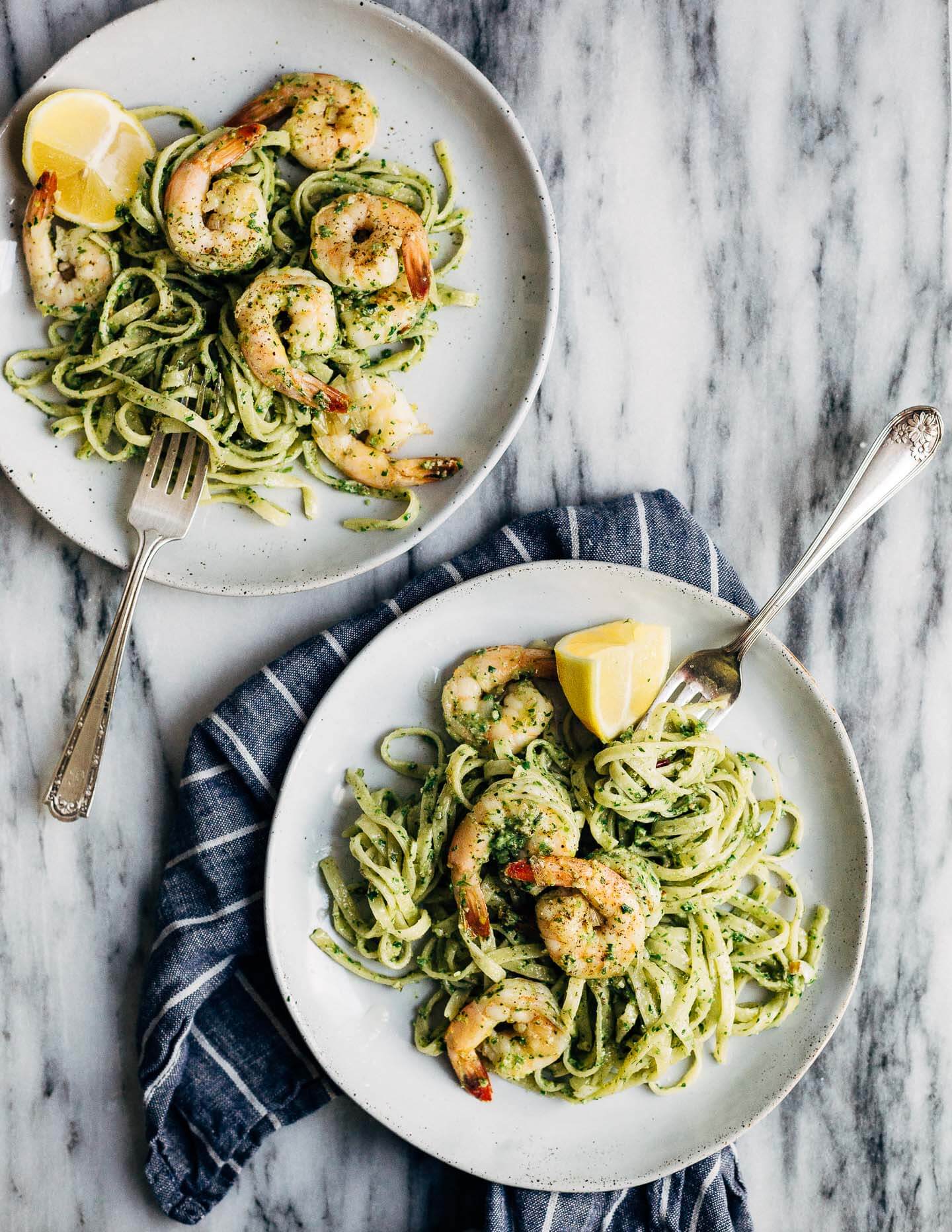 Celebrating the season's first shoots with a vibrant spring onion and chive pesto pasta tossed with sautéed shrimp that's perfect for dinner parties or a quick weeknight meal.