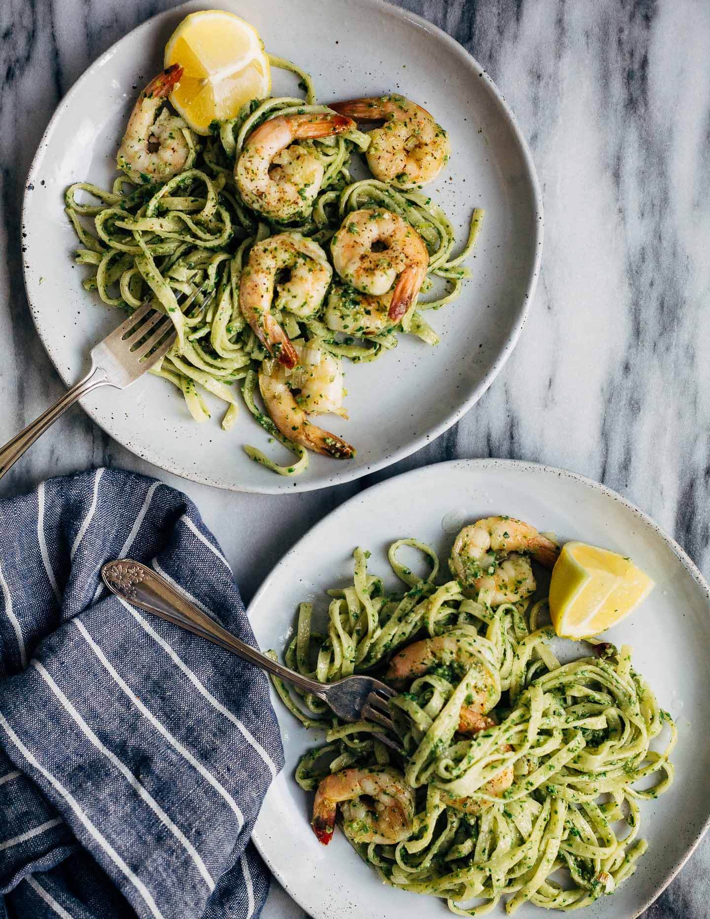 Celebrating the season's first shoots with a vibrant spring onion and chive pesto pasta tossed with sautéed shrimp that's perfect for dinner parties or a quick weeknight meal.