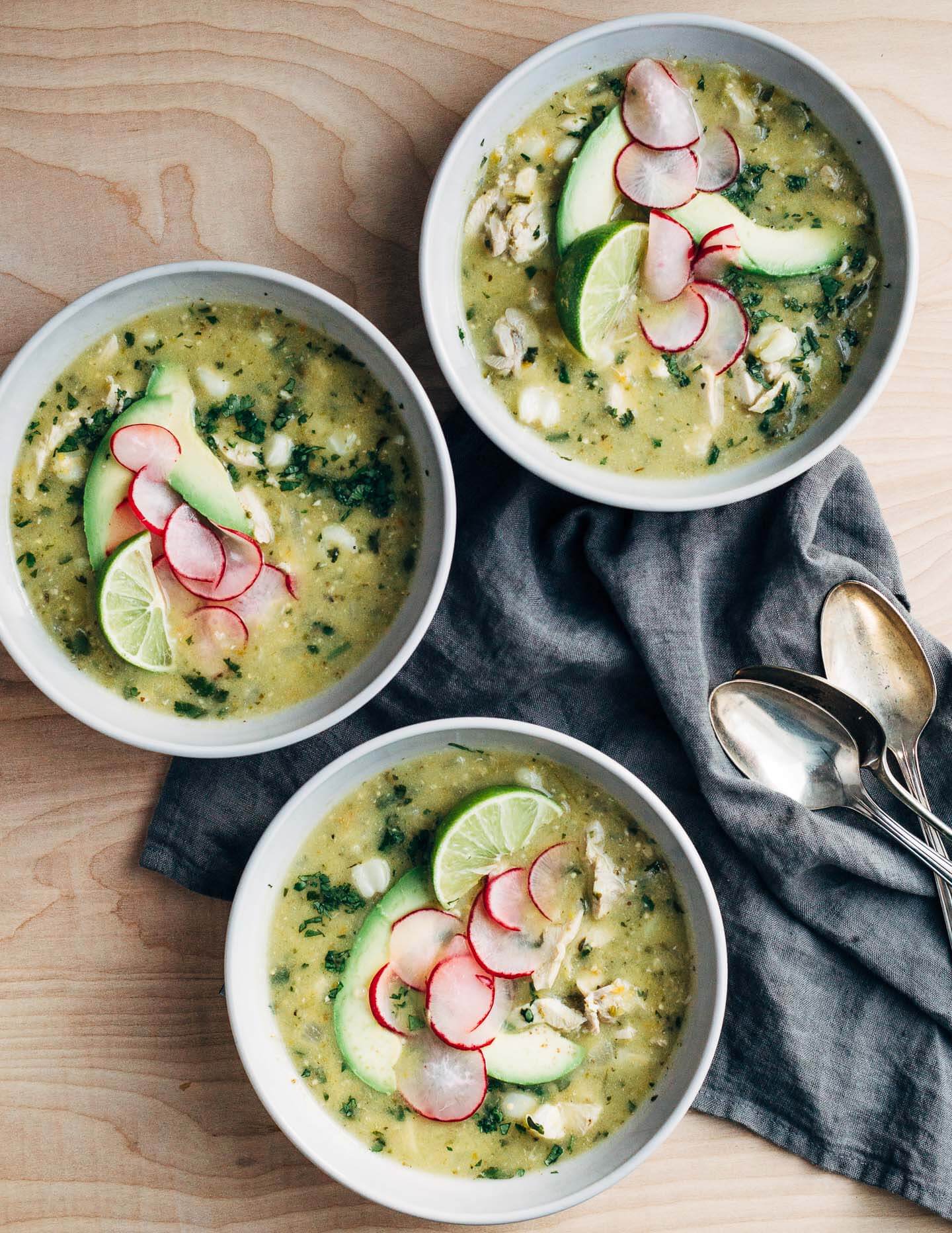 A fortifying mix of rich chicken broth, tender shredded chicken, chewy corn hominy, and tart tomatillos make this chicken pozole verde the ideal dish to see you through the end of winter (and cold season). 