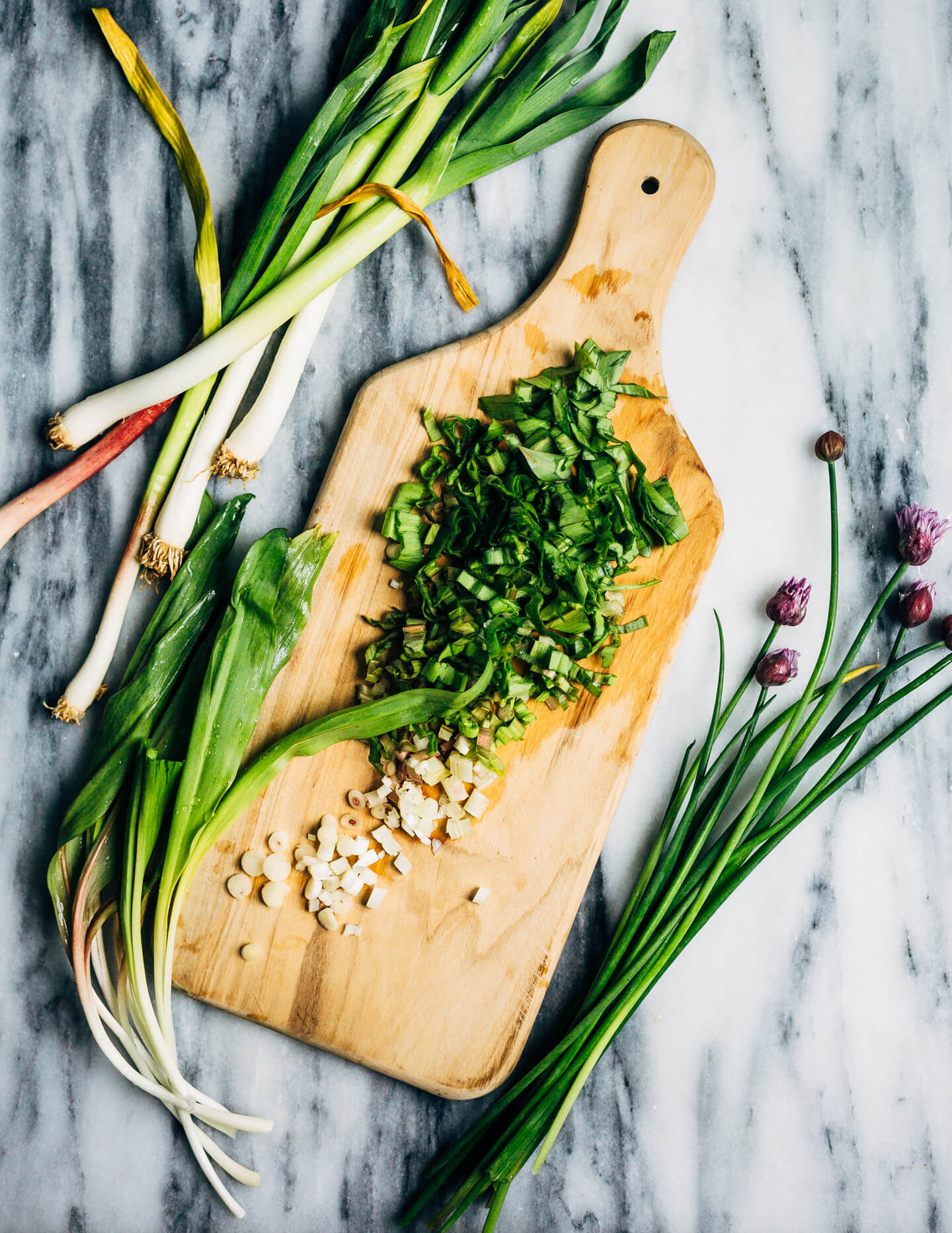 Ideal for Mother's Day brunch or spring gatherings, this sheet pan spinach quiche, made with ramps, green garlic, and chives, is a delicious way to feed a crowd. 