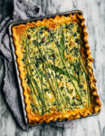 Ideal for Mother's Day brunch or spring gatherings, this sheet pan spinach quiche, made with ramps, green garlic, and chives, is a delicious way to feed a crowd. 