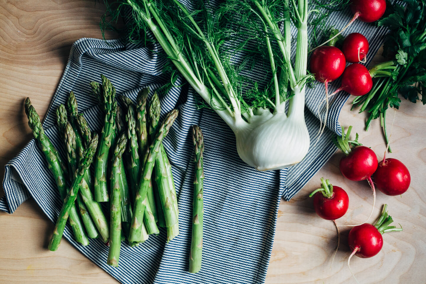 A substantial, spring-inspired fennel, radish, and asparagus salad with creamy buttermilk-lime dressing and steamed hard-boiled eggs. 