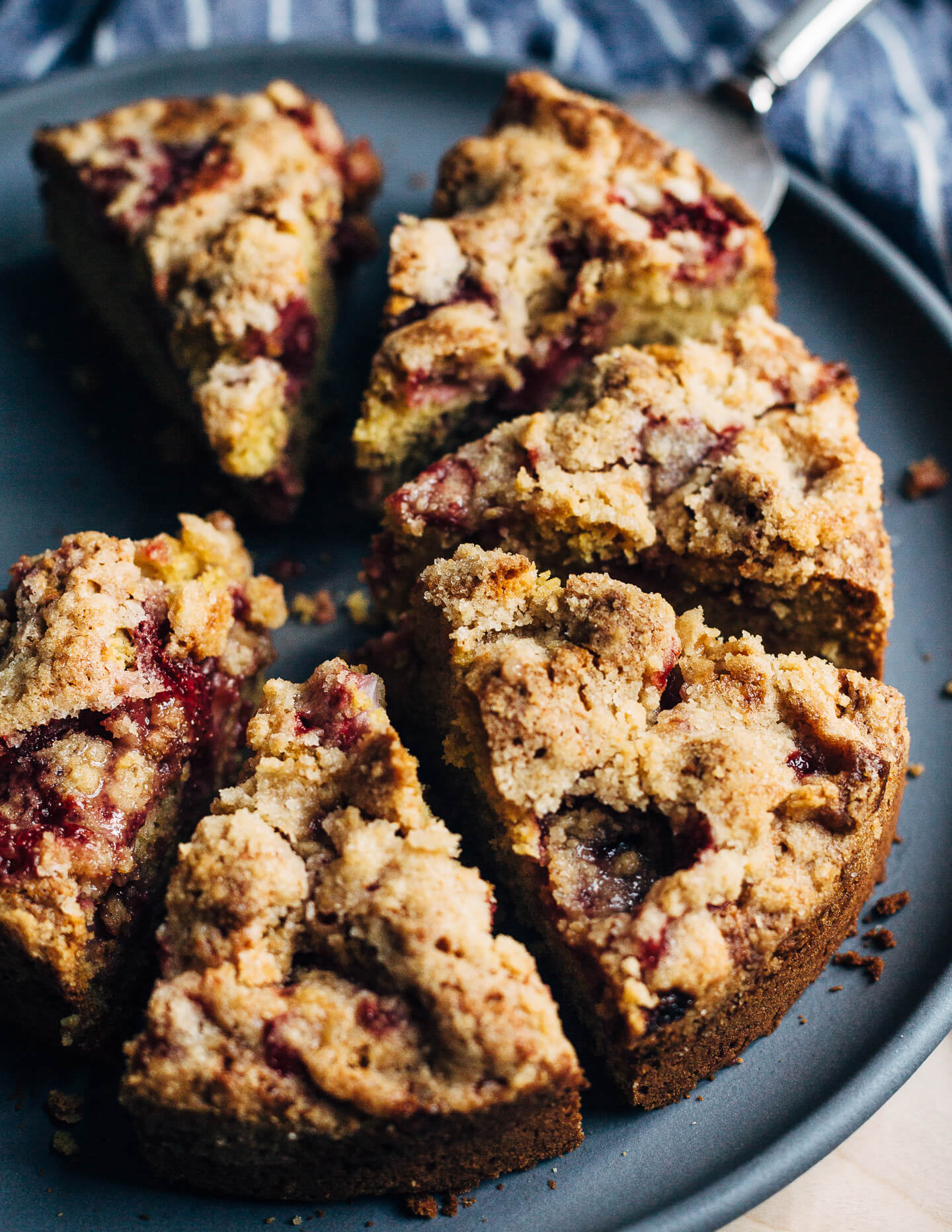 This strawberry crumb cake has a toothsome whole wheat crumb and is topped with ripe strawberries, a perfectly salty-sweet crumb topping, and unsweetened whipped cream. 