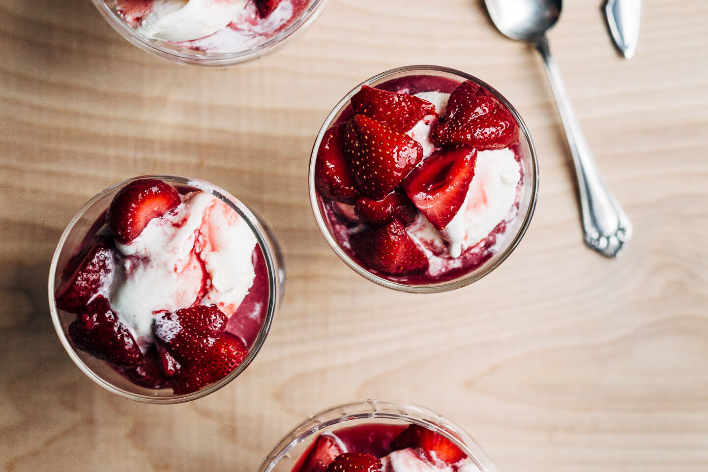 Ripe strawberries in red wine is the kind of effortless summer dessert that we all need more of. With hints of lemon and fresh thyme, the red wine reduction melds beautifully with ripe strawberries and is perfect spooned over vanilla ice cream. 