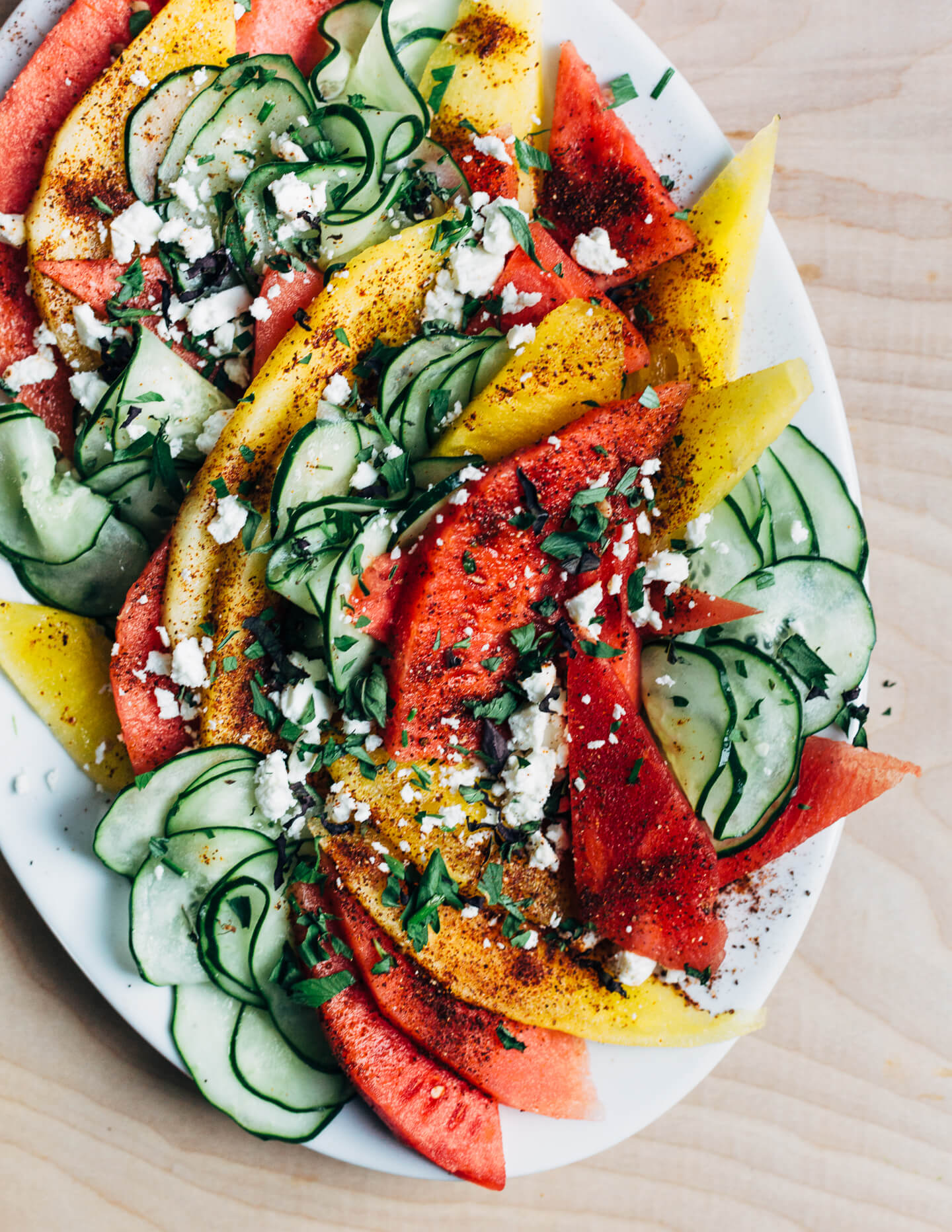 A refreshing cucumber-watermelon salad that pairs spicy-sweet watermelon wedges with lime-infused cucumbers. Spicy and cooling, this effortless summer salad is a knockout. 