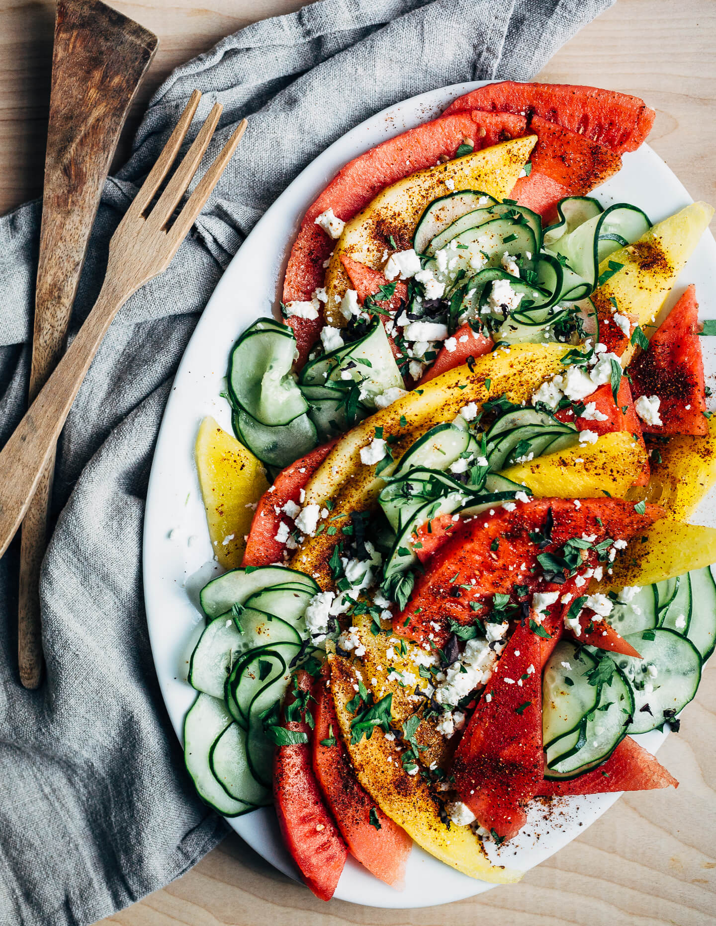 A refreshing cucumber-watermelon salad that pairs spicy-sweet watermelon wedges with lime-infused cucumbers. Spicy and cooling, this effortless summer salad is a knockout. 