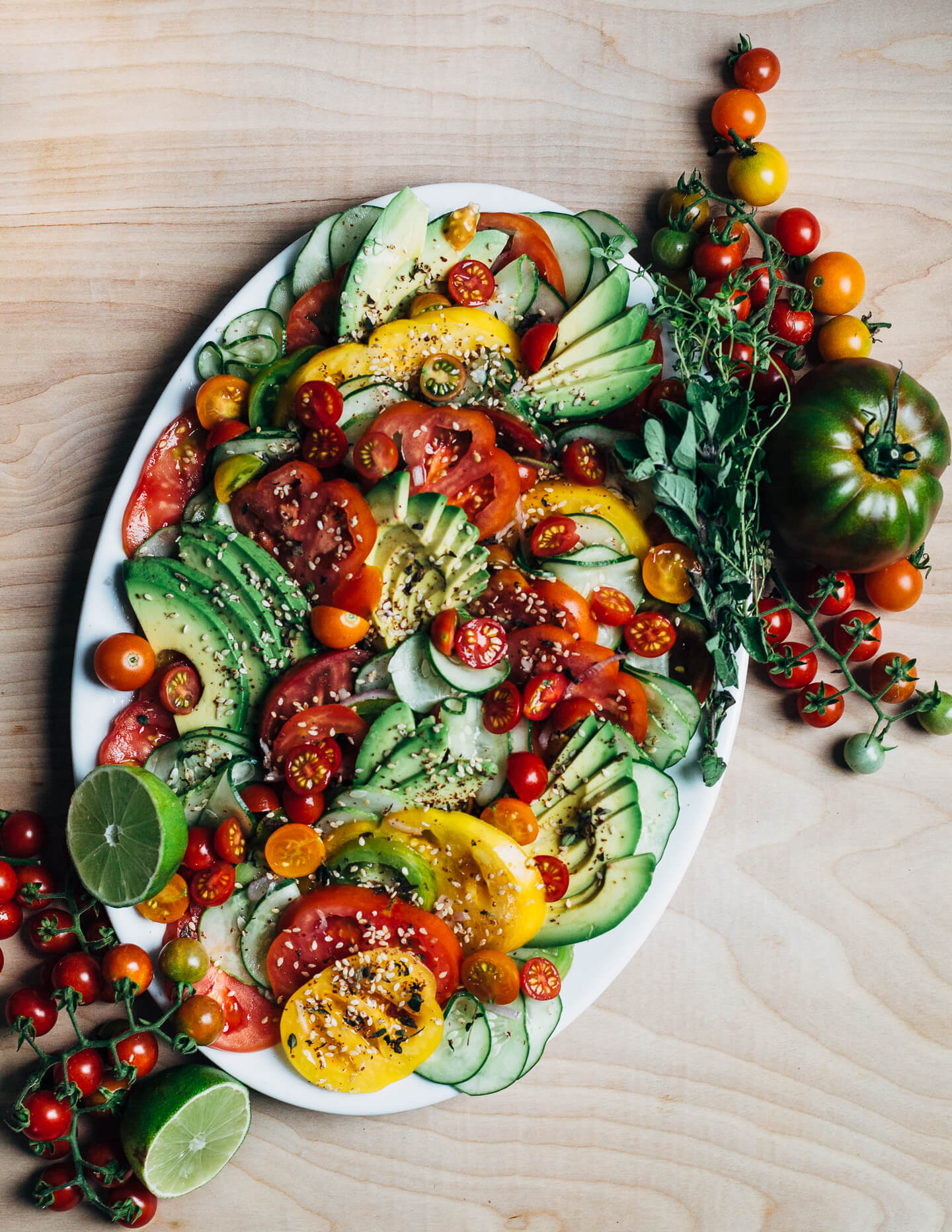 We're celebrating a decade of Brooklyn Supper with a summery avocado and tomato salad sprinkled with lime juice and fresh za'atar. 